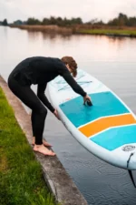 Moai 10'6 SUP board op een kalm meer